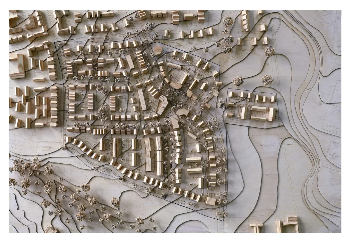 Physical scale model of a housing development and surrounding landscape
